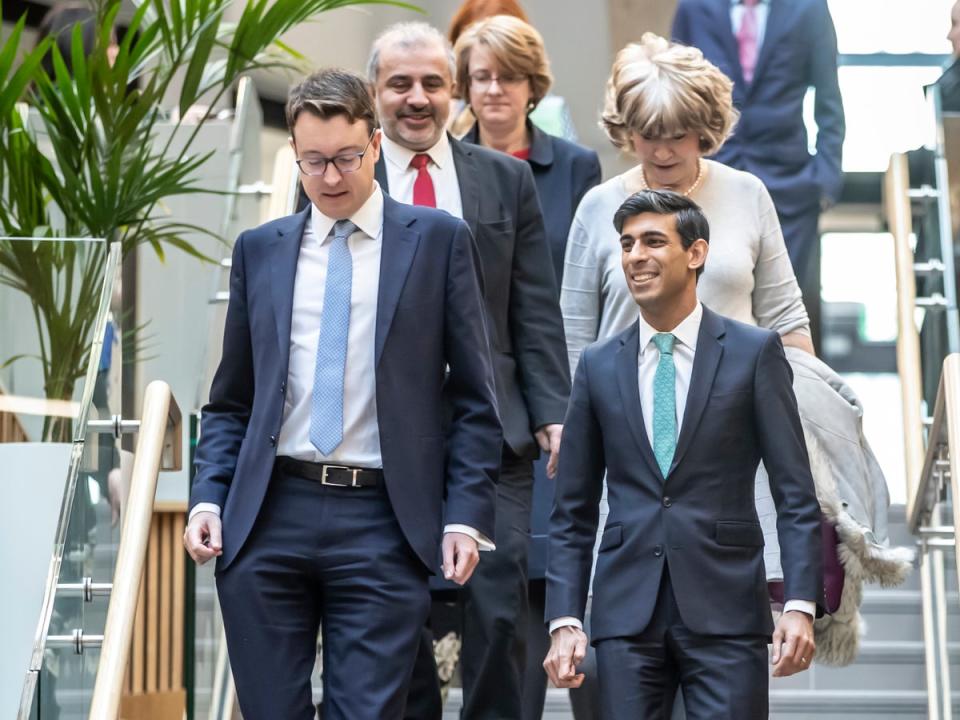 Sir Simon with Rishi Sunak during visit to the University of Leeds (PA)