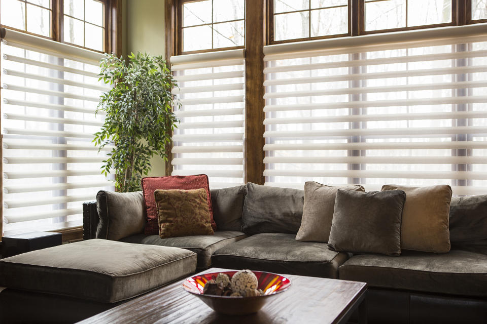 Neat blinds will help to keep your room in perspective, according to interiors expert Jenny Shu. Photo: Getty