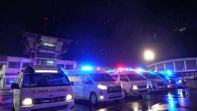 Ambulances wait to carry passengers from a London-Singapore flight that encountered severe turbulence, in Bangkok, Thailand, Tuesday, May 21, 2024. The plane apparently plummeted for a number of minutes before it was diverted to Bangkok, where emergency crews rushed to help injured passengers amid stormy weather, Singapore Airlines said Tuesday.