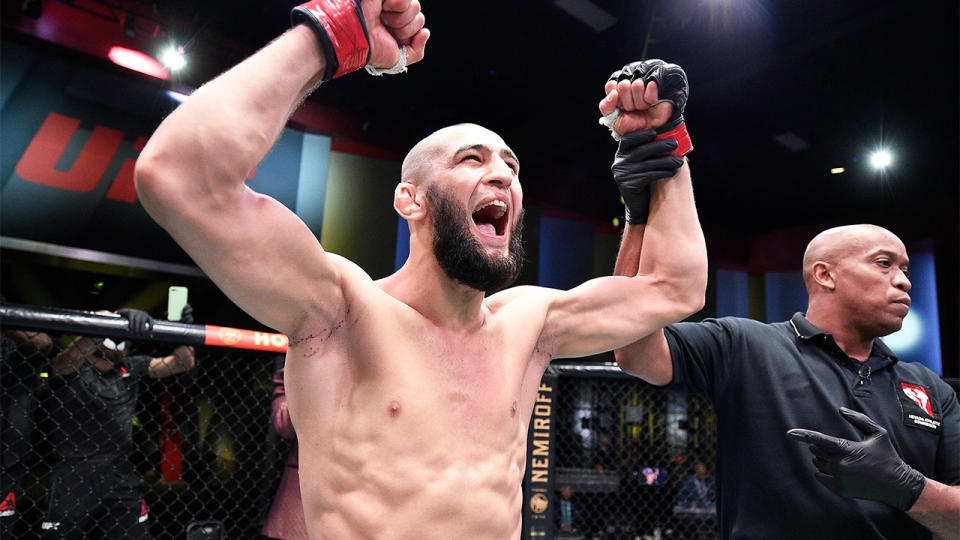 Khamzat Chimaev (pictured) gets his hand raised as he celebrates a victory.