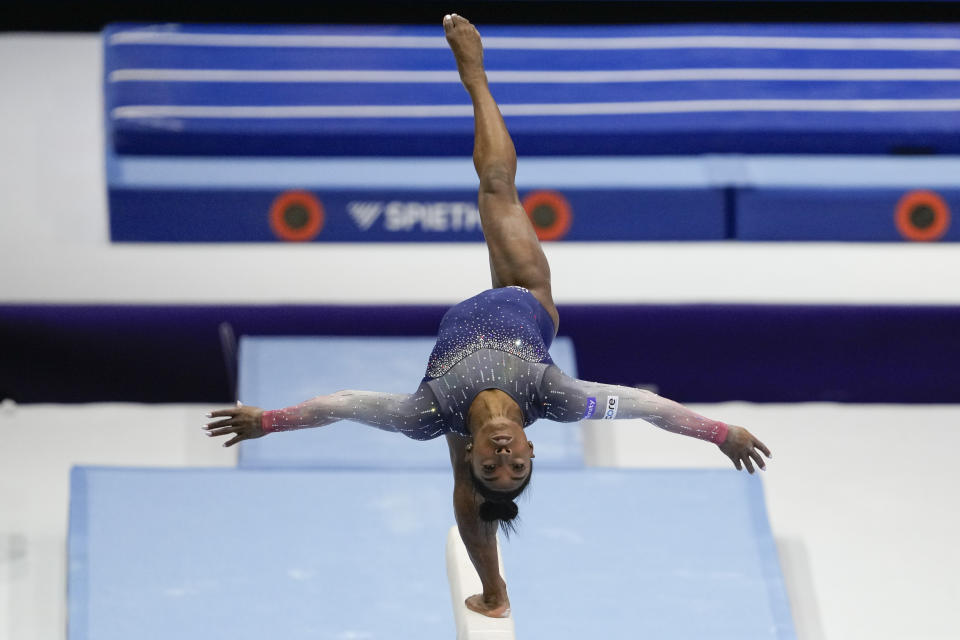 United States' Simone Biles competes on the beam during the women's team final at the Artistic Gymnastics World Championships in Antwerp, Belgium, Wednesday, Oct. 4, 2023. (AP Photo/Virginia Mayo)