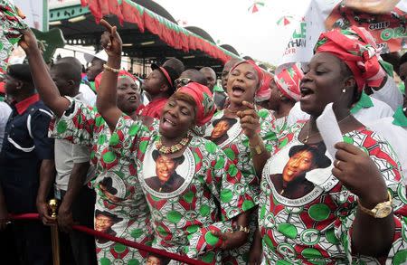 Supporters of Nigeria's President Goodluck Jonathan react during his declaration to seek a second term in the February 2015 presidential election, in Abuja in this November 11, 2014 file photo. REUTERS/Afolabi Sotunde/Files