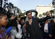 Premiere of “Avengers: Infinity Wars” - Arrivals - Los Angeles, California, U.S., 23/04/2018 - Actor Chris Hemsworth poses with fans. REUTERS/Mario Anzuoni