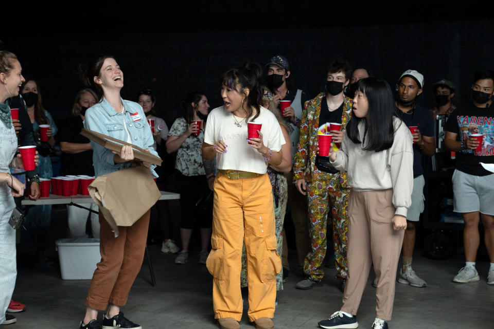 (L-R): Writer/Producer Jen D'Angelo, Sandra Oh, and Awkwafina on the set of 20th Century Studios' Quiz Lady. (Photo by Michele K Short/20th Century Studios)