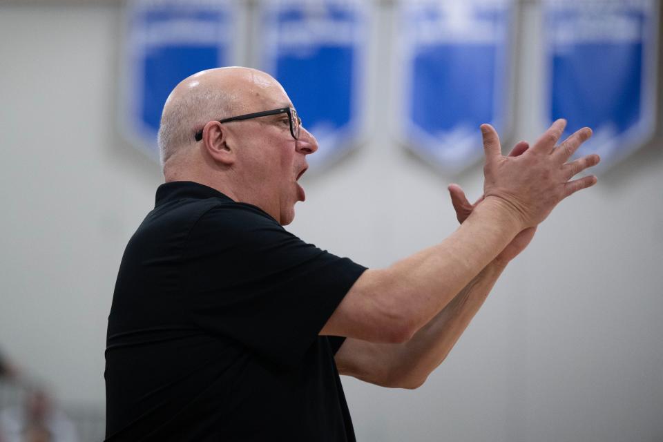 Archbishop Wood boys basketball head coach John Mosco cheers on the sidelines during the PIAA semifinal game against Roman Catholic at Bensalem High School on Tuesday, March 21, 2023. The Vikings fell to Roman Catholic, 66-56.