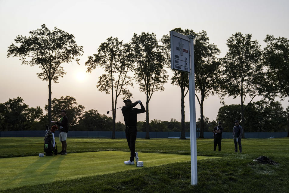 Tiger Woods watches his shot off the fourth tee during practice before the U.S. Open Championship golf tournament at Winged Foot Golf Club, Wednesday, Sept. 16, 2020, in Mamaroneck, N.Y. (AP Photo/John Minchillo)