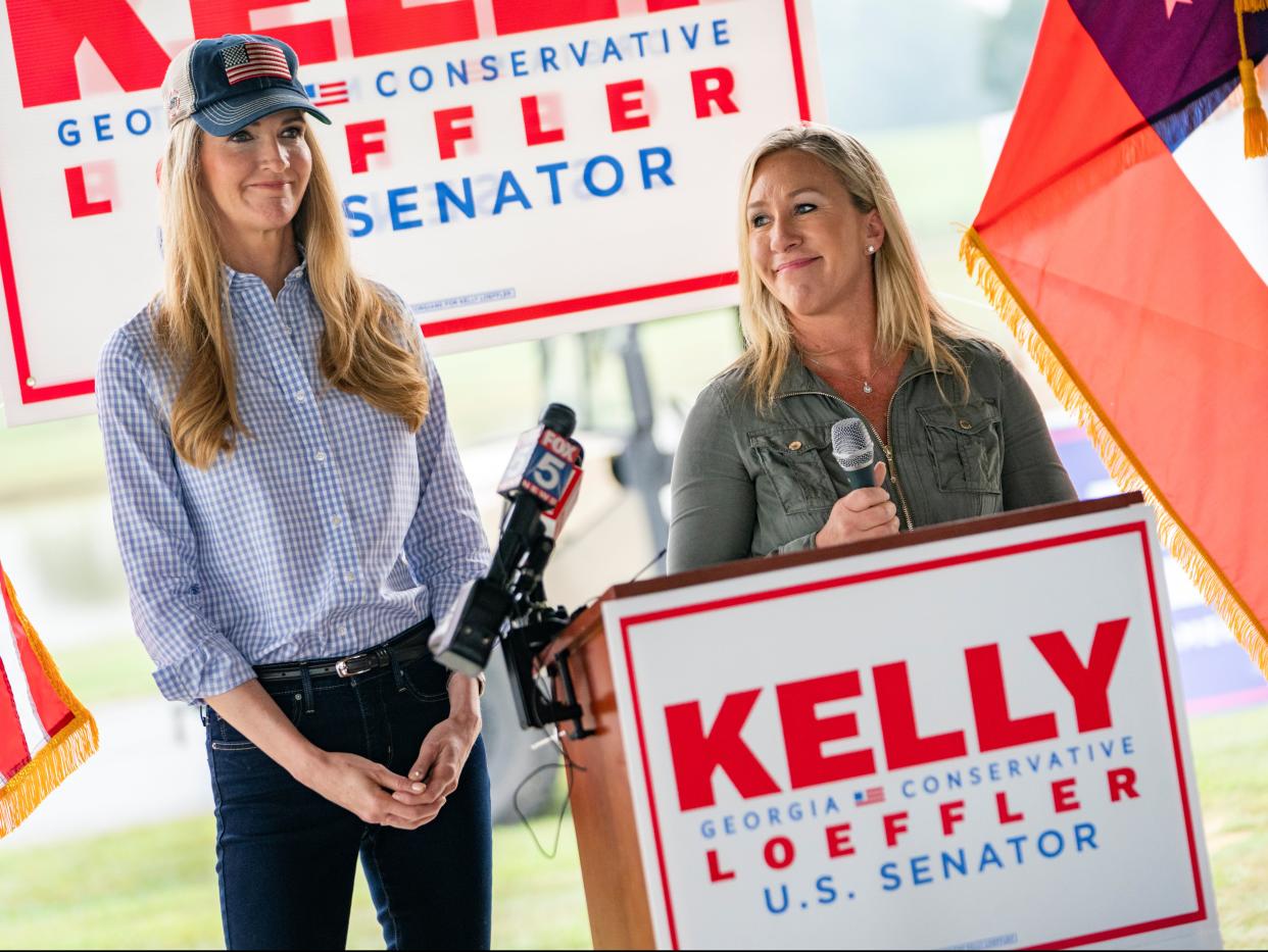 US Senator Kelly Loeffler and Republican U.S. House candidate Marjorie Taylor Greene speak at a news conference in Dallas, Georgia,  (REUTERS)