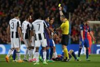 Football Soccer - FC Barcelona v Juventus - UEFA Champions League Quarter Final Second Leg - The Nou Camp, Barcelona, Spain - 19/4/17 Barcelona's Neymar is shown a yellow card by referee Bjorn Kuipers Reuters / Albert Gea Livepic