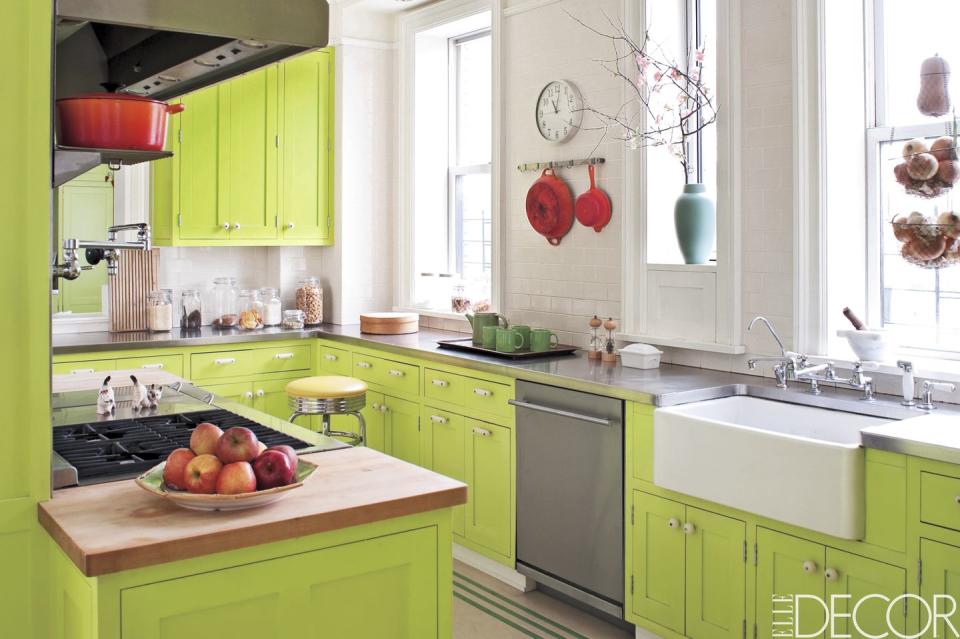 <p>White tiled walls balance out vibrant <a href="https://www.elledecor.com/home-remodeling-renovating/a8639913/ikea-kitchen-cabinets/" rel="nofollow noopener" target="_blank" data-ylk="slk:kitchen cabinets;elm:context_link;itc:0;sec:content-canvas" class="link ">kitchen cabinets</a>, which are painted in <a href="https://www.benjaminmoore.com/en-us/color-overview/find-your-color/color/2025-10/bright-lime" rel="nofollow noopener" target="_blank" data-ylk="slk:Bright Lime by Benjamin Moore;elm:context_link;itc:0;sec:content-canvas" class="link ">Bright Lime by Benjamin Moore</a> in this <span class="redactor-unlink">Manhattan</span> kitchen. The countertops are stainless steel and the sink is by <a href="https://www.franke.com/us/en/ks/products/kitchen-sinks.html" rel="nofollow noopener" target="_blank" data-ylk="slk:Franke;elm:context_link;itc:0;sec:content-canvas" class="link ">Franke</a>.<br></p>