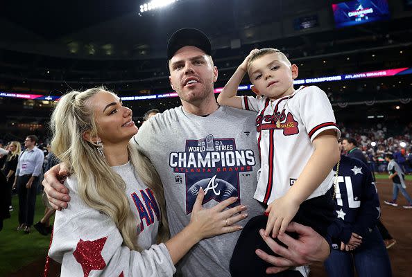 HOUSTON, TEXAS - NOVEMBER 02:  Freddie Freeman #5 of the Atlanta Braves celebrates with his family after the team's 7-0 victory against the Houston Astros in Game Six to win the 2021 World Series at Minute Maid Park on November 02, 2021 in Houston, Texas. (Photo by Carmen Mandato/Getty Images)