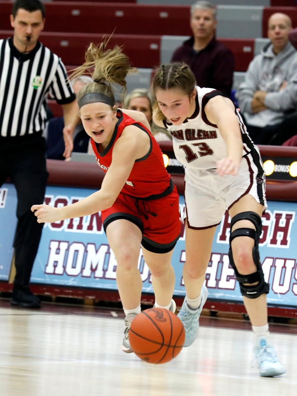 Freshman Mylie Forgrave, left, chases after loose ball with Riley Zamensky during Sheridan's 58-55 win against host John Glenn on Saturday in New Concord. The Generals overcame a nine-point second-half deficit to stay unbeaten.