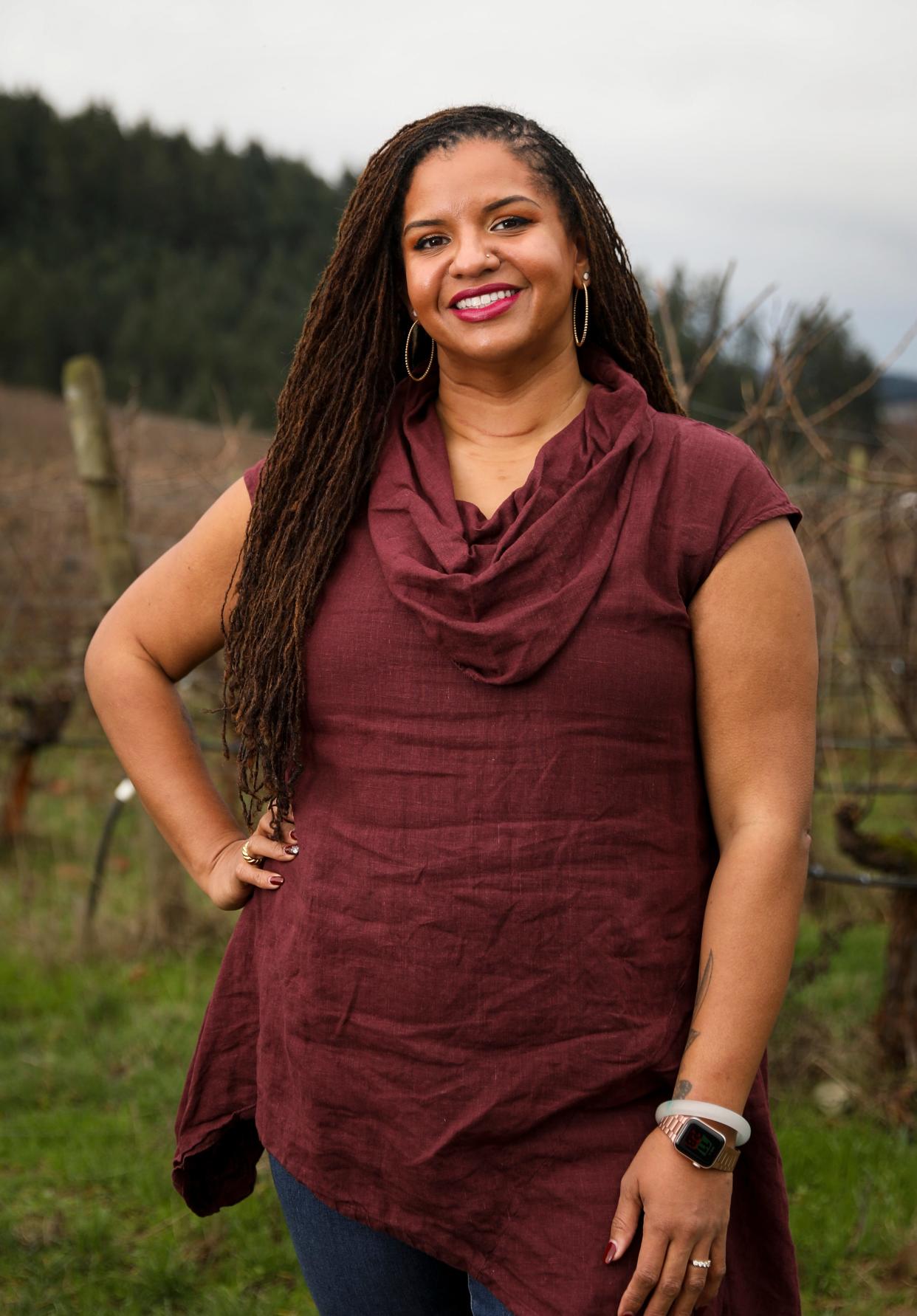 Tiquette Bramlett, USA TODAY's Women of the Year honoree from Oregon, on Wednesday, Jan. 11, 2023 at WillaKenzie Estate in Yamhill, Ore. Bramlett is the first Black woman appointed to oversee a U.S. winery and the founder of Our Legacy Harvested, an organization whose aim is to advance the BIPOC community in the wine industry.