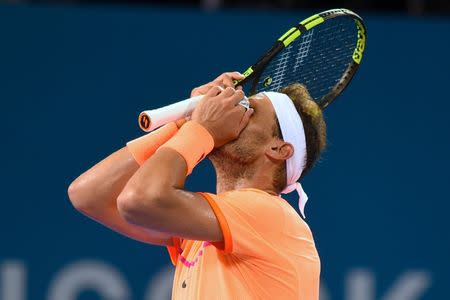 Tennis - Brisbane International - Pat Rafter Arena, Brisbane, Australia - 6/1/17 - Spain's Rafael Nadal reacts during his match against Canada's Milos Raonic. REUTERS/Steve Holland