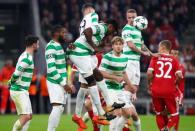 Soccer Football - Champions League - Bayern Munich vs Celtic - Allianz Arena, Munich, Germany - October 18, 2017 Celtic’s Dedryck Boyata and Mikael Lustig attempt to block REUTERS/Michael Dalder