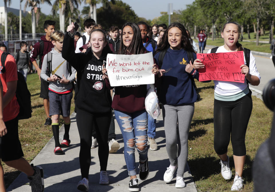 Students from Westglades Middle School in Parkland, Fla., walk out as part of a nationwide protest against gun violence on Wednesday. (Lynne Sladky/AP)