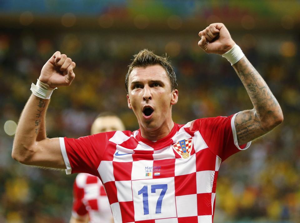 Croatia's Mario Mandzukic celebrates after scoring a goal during their 2014 World Cup Group A soccer match against Cameroon at the Amazonia arena in Manaus June 18, 2014. REUTERS/Siphiwe Sibeko (BRAZIL - Tags: SOCCER SPORT WORLD CUP)