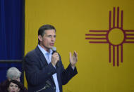 Incumbent Democratic Sen. Martin Heinrich of New Mexico speaks at a New Mexico Democratic rally in Albuquerque, N.M., on Monday, Nov. 5, 2018. New Mexico candidates for governor, a lone Senate seat and two open congressional districts barnstormed through major cities Monday to rally supporters in the wake of record-breaking early voter turnout. (AP Photo/Russell Contreras)