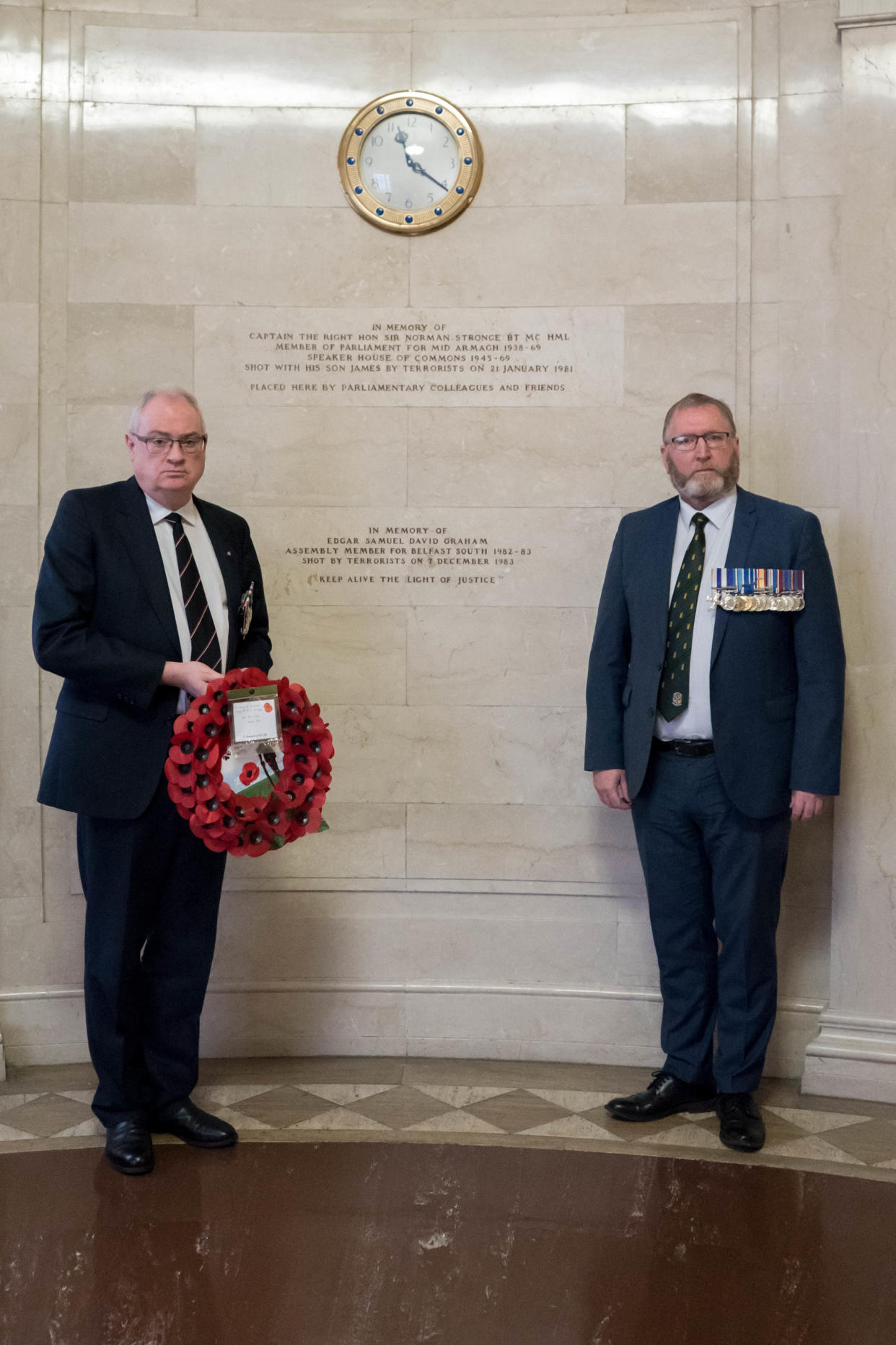 Steve Aiken and Doug Beattie lay a wreath