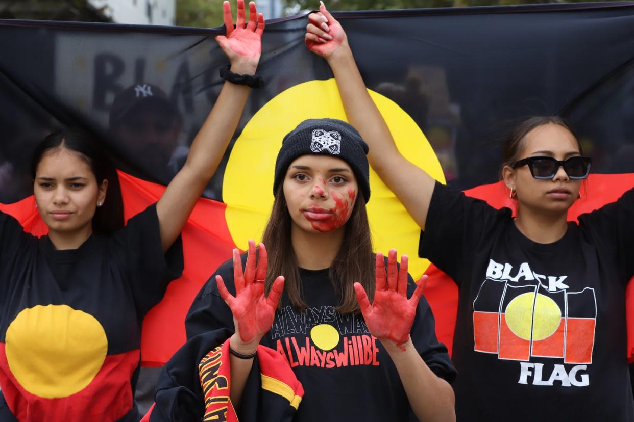   <span class="attribution"><a class="link " href="https://media.gettyimages.com/photos/members-of-the-indigenous-community-march-towards-flinders-street-a-picture-id1311740388?s=2048x2048" rel="nofollow noopener" target="_blank" data-ylk="slk:Diego Fedele/Getty Images;elm:context_link;itc:0;sec:content-canvas"> Diego Fedele/Getty Images</a></span>