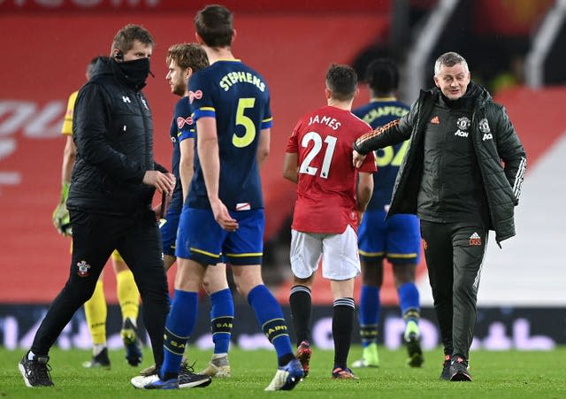 Ole Gunnar Solskjaer (right) celebrates a huge win