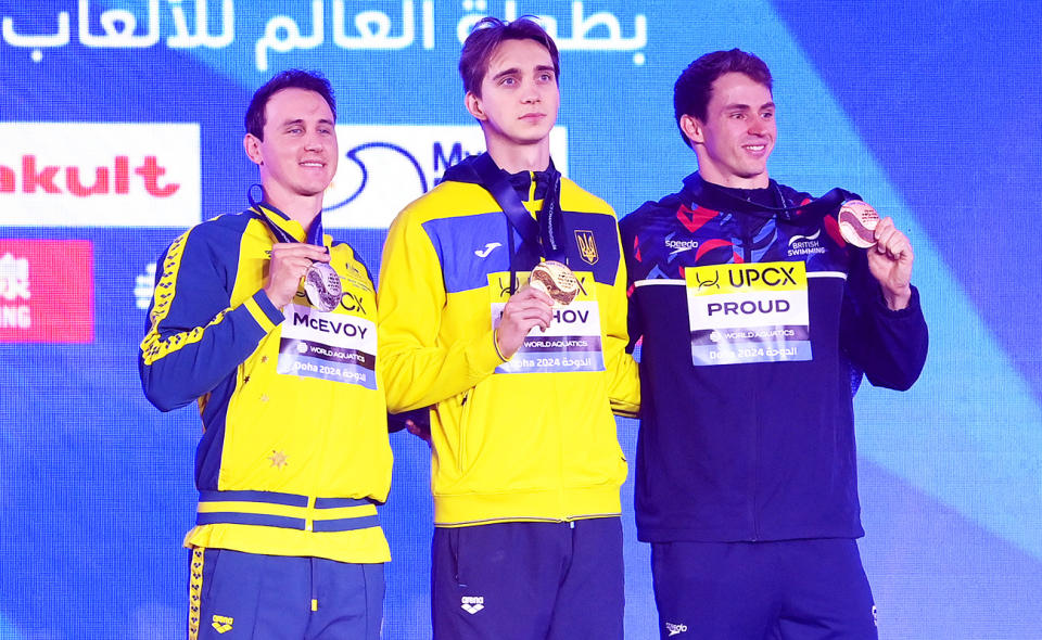 Cameron McEvoy, Vladyslav Bukhov and Benjamin Proud at the swimming world championships.