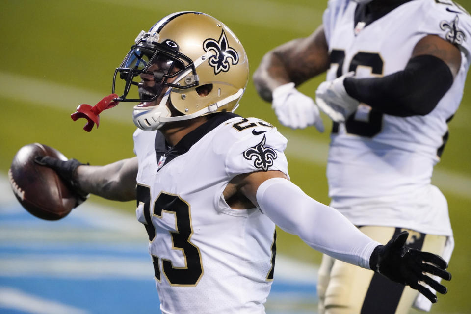 New Orleans Saints cornerback Marshon Lattimore celebrates after an interception during the second half of an NFL football game against the Carolina Panthers Sunday, Jan. 3, 2021, in Charlotte, N.C. (AP Photo/Brian Blanco)