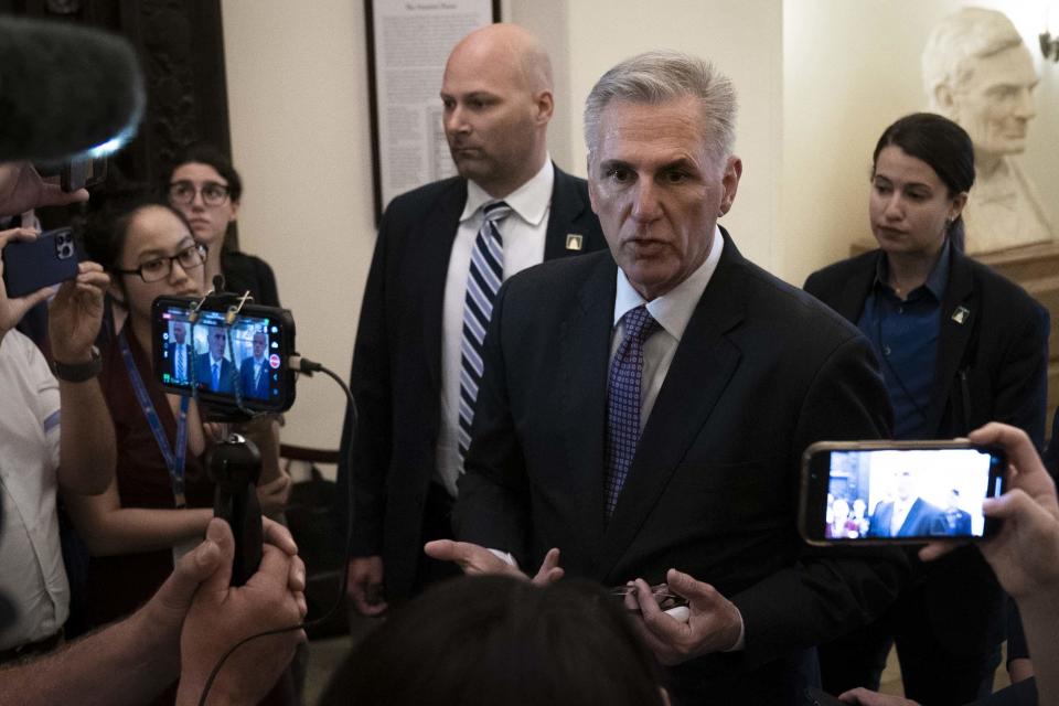 House Speaker Kevin McCarthy speaks to members of the media while arriving to the U.S. Capitol on Wednesday, May 31, 2023.  / Credit: Sarah Silbiger/Bloomberg via Getty Images