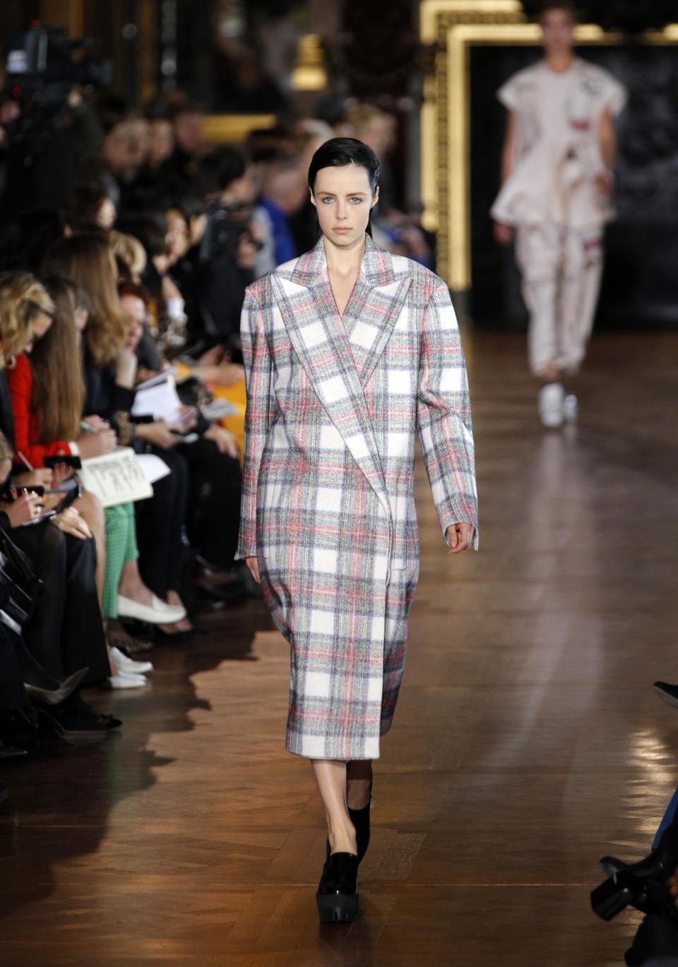 A model wears a creation by fashion designer Stella McCartney for her Fall/Winter 2013-2014 ready to wear collection, in Paris, Monday, March, 4, 2013. (AP Photo/Christophe Ena)