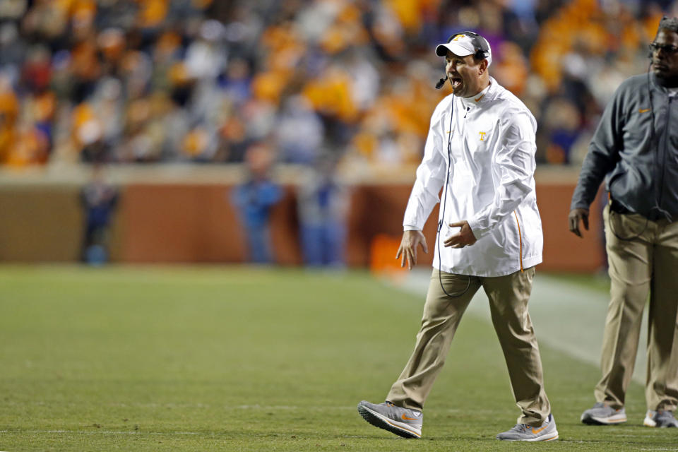 Tennessee head coach Jeremy Pruitt yells to his p[layers in the second half of an NCAA college football game against Kentucky Saturday, Nov. 10, 2018, in Knoxville, Tenn. Tennessee won 24-7. (AP Photo/Wade Payne)