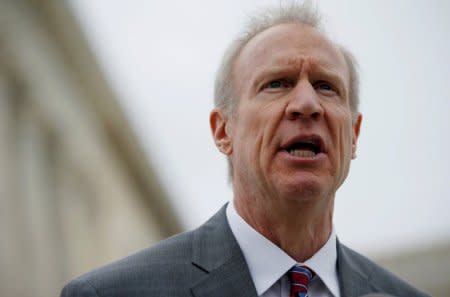 FILE PHOTO: Illinois Gov. Bruce Rauner speaks to the news media outside of the United States Supreme Court in Washington, U.S., February 26, 2018. REUTERS/Leah Millis/File Photo