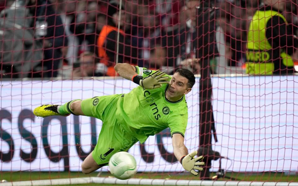 Aston Villa's goalkeeper Emiliano Martinez save the ball from a penalty during Europa Conference League quarter final second leg soccer match between Lille and Aston Villa at the Pierre Mauroy stadium in Villeneuve d'Ascq, northern France, Thursday, April 18, 2024. Aston Villa is in semi finals as beat Lille in penalties 4-3