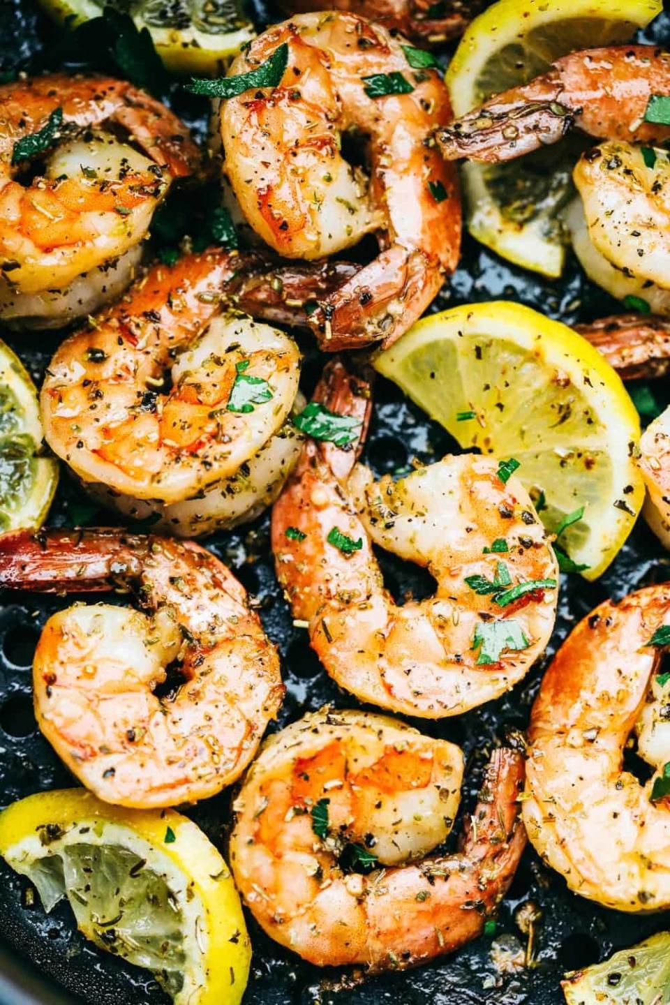 Air fryer shrimp with lemon and parsley.