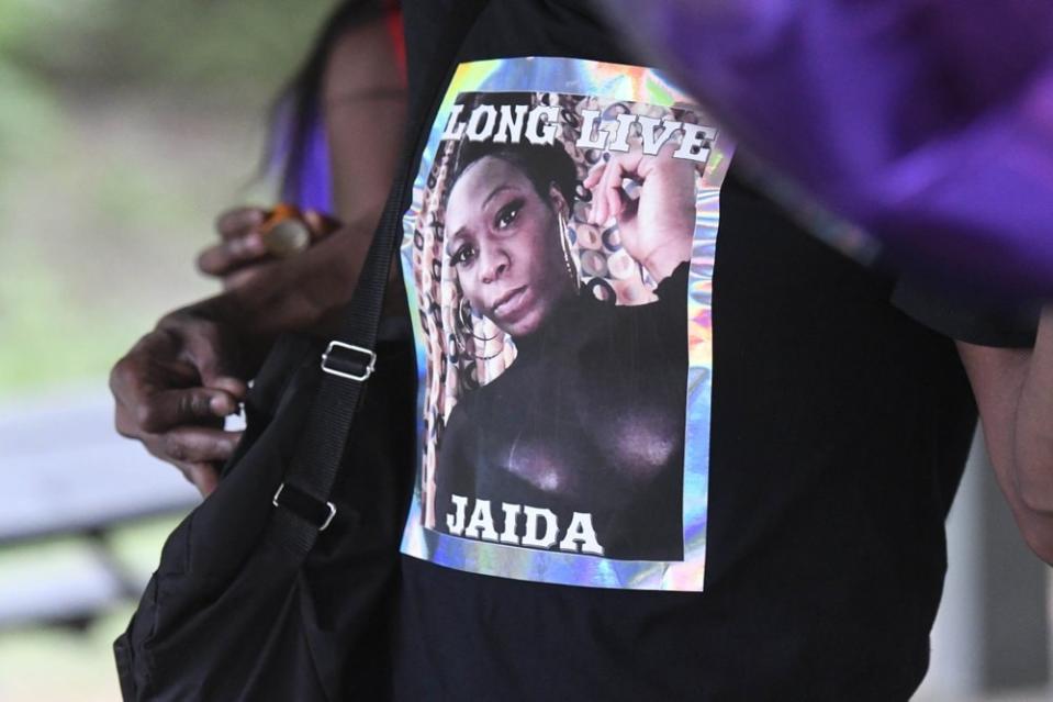 An attendee to a memorial for Jaida Peterson wears a T-shirt with her photo on it Friday, April 9, 2021, at Tuckaseegee Park in Charlotte, NC. Peterson, a transgender woman, was found dead in a hotel room on Easter Sunday, April 4. (David T. Foster III/The Charlotte Observer via AP)