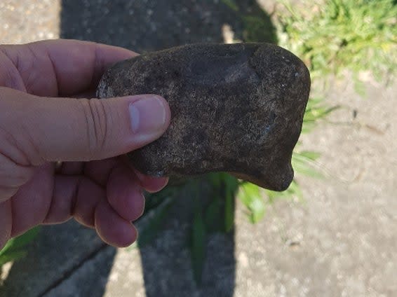 A rock that was catapulted at police officers attending the scene in Stanwell Village, Surrey (Surrey Police)