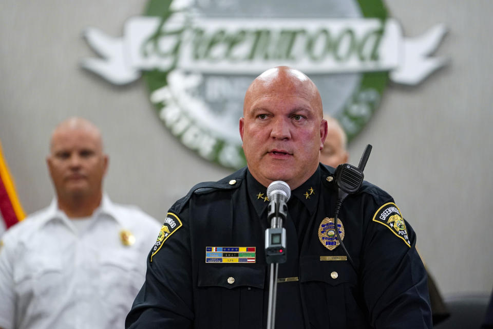 Greenwood Police Chief James Ison speak during a press conference at the Greenwood City Center in Greenwood, Ind., Monday, July 18, 2022. Police say three people were fatally shot and two were injured, including a 12-year-old girl, after Jonathan Douglas Sapirman, 20, opened fire with a rifle in a food court and an armed civilian shot and killed him. (AP Photo/Michael Conroy)