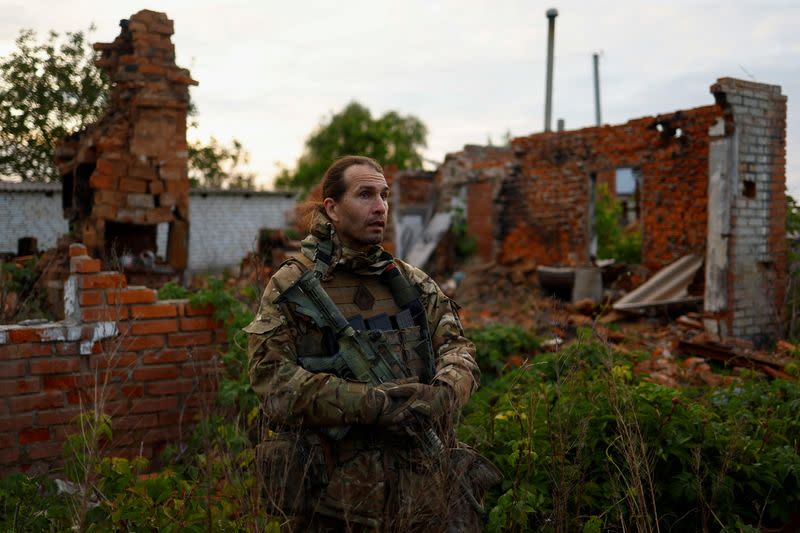 Deputy commander of the pro-Ukrainian Russian paramilitary group Freedom of Russia Legion Maksimilian Andronnikov speaks with Reuters after fighting with Russian troops near the border in Kharkiv region