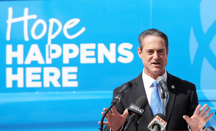 Orange County District Attorney Todd Spitzer speaks during a press conference on Thursday morning for the official launch of the city of Huntington BeachOs first mobile mental health crisis program, known as Be Well OC, at Huntington Beach Civic Center Plaza on Sept. 16, 2021. (Kevin Chang / Daily Pilot)