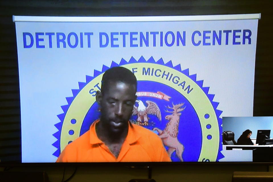 FILE - DeAngelo Martin is arraigned via video on Monday, June 10, 2019 in 36th District Court in Detroit. Martin killed four women and raped two others before being captured in 2019. Repeatedly over the previous 15 years Detroit police failed to follow up on leads or take investigative steps that may have averted the killing spree, an Associated Press investigation has found. (David Guralnick/Detroit News via AP, File)