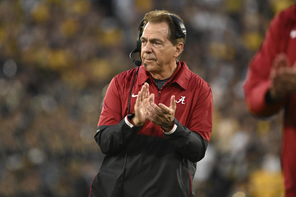 FILE - Alabama head coach Nick Saban reacts after running back Jase McClellan (2) scored a touchdown during the second half of the Rose Bowl CFP NCAA semifinal college football game against Michigan Monday, Jan. 1, 2024, in Pasadena, Calif. Nick Saban, the stern coach who won seven national championships and turned Alabama back into a national powerhouse that included six of those titles in just 17 seasons, is retiring, according to multiple reports, Wednesday, Jan. 10, 2024. (AP Photo/Kyusung Gong, File)