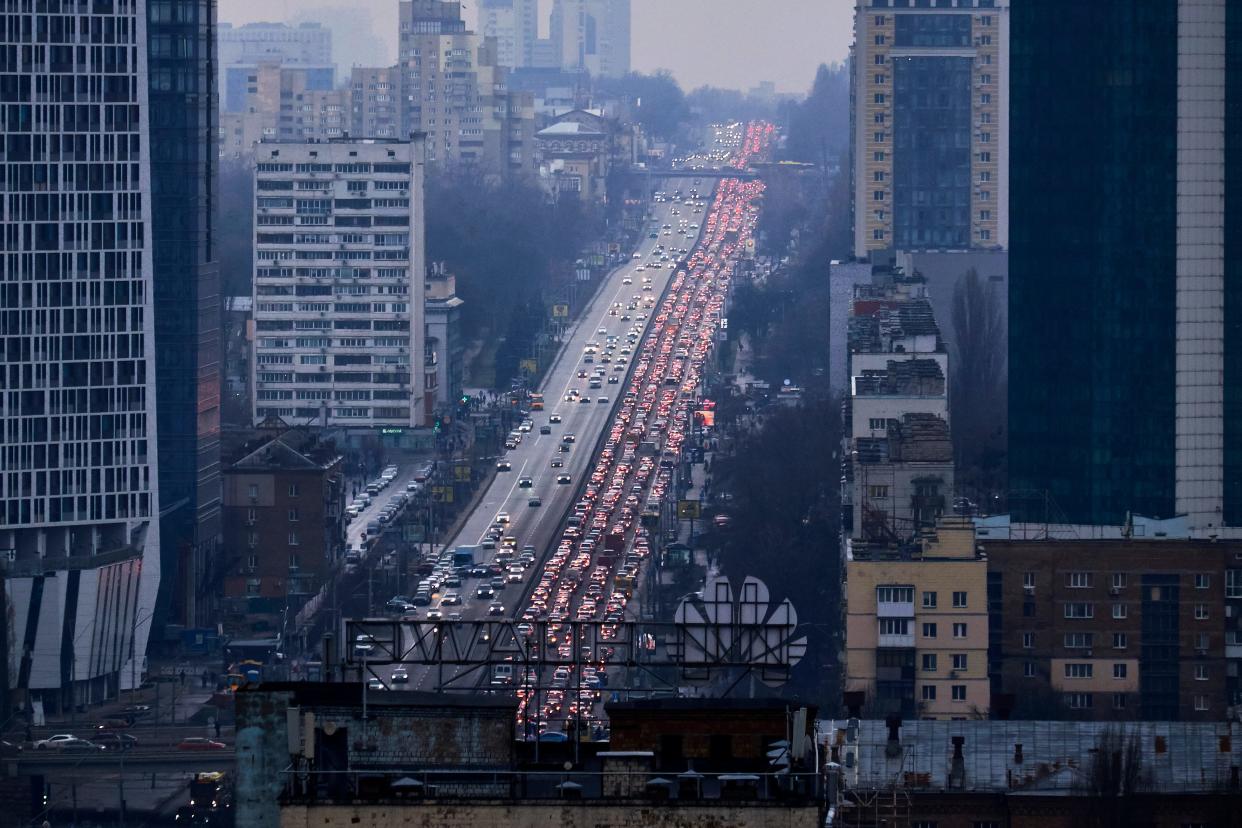 Inhabitants of Kyiv leave the city following pre-offensive missile strikes of the Russian armed forces and Belarus on February 24, 2022 in Kyiv, Ukraine. Overnight, Russia began a large-scale attack on Ukraine, with explosions reported in multiple cities and far outside the restive eastern regions held by Russian-backed rebels.