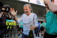 Formula One - Russian Grand Prix - Sochi, Russia - 1/5/16 - Mercedes F1 driver Nico Rosberg of Germany celebrates his victory with the team. REUTERS/Maxim Shemetov