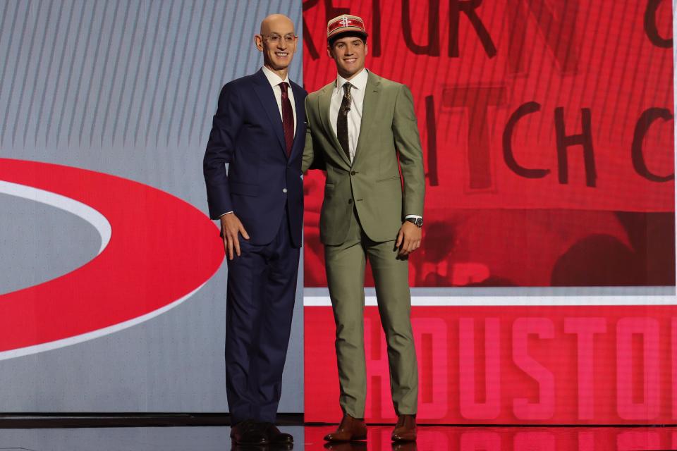 Jun 26, 2024; Brooklyn, NY, USA; Reed Sheppard poses for photos with NBA commissioner Adam Silver after being selected in the first round by the Houston Rockets in the 2024 NBA Draft at Barclays Center. Mandatory Credit: Brad Penner-USA TODAY Sports