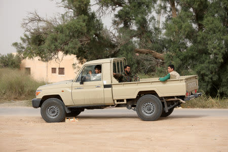 A member of Eastern forces is captured by Libyan internationally recognised government forces in Al Hira area, south western Tripoli, Libya April 23, 2019. REUTERS/Hani Amara