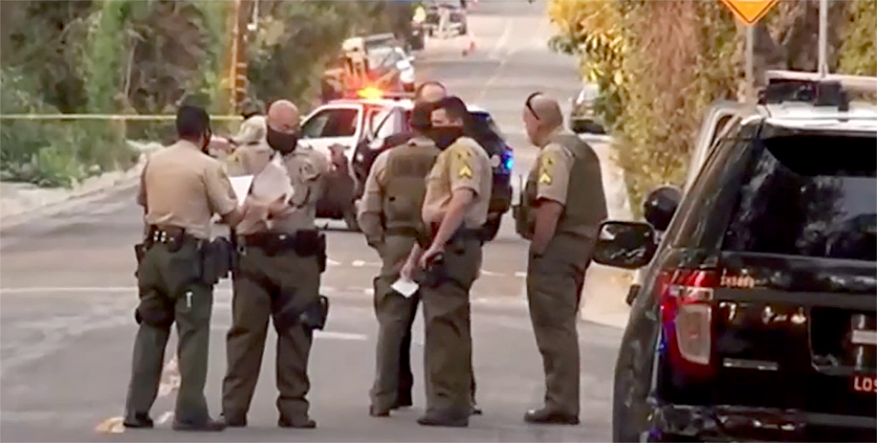 Image: Los Angeles County Sheriff's Department officers at the scene of a stabbing in Altadena, March 22, 2021. (NBC4)