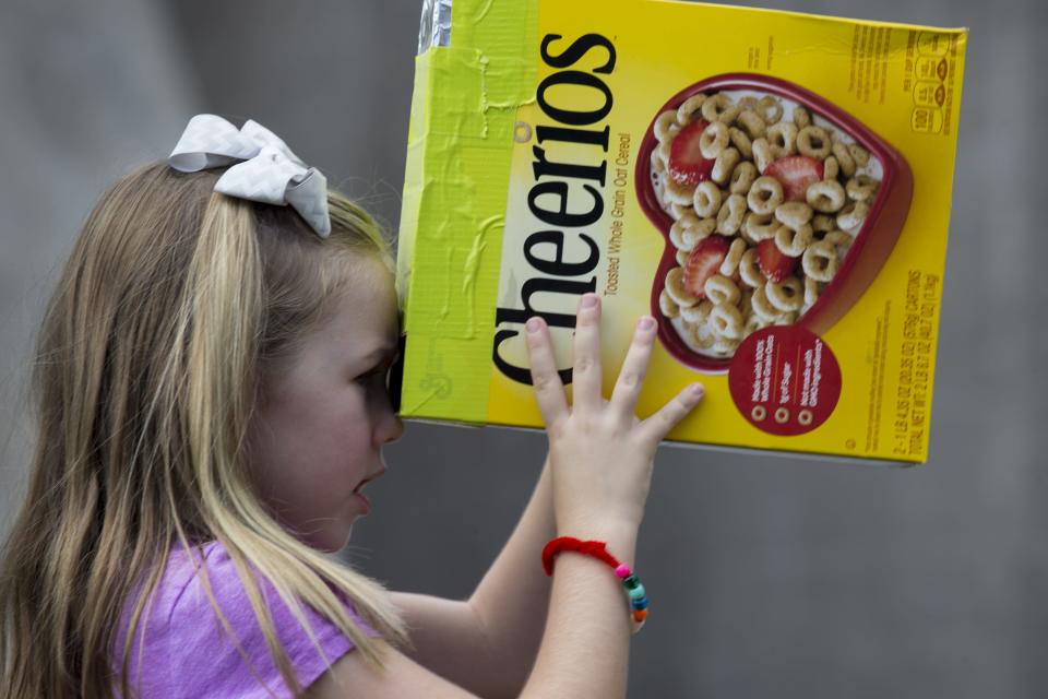 Lauren Grant (6) views the solar eclipse at the Arizona Science Center, 600 E. Washington Street, Phoenix in 2017.