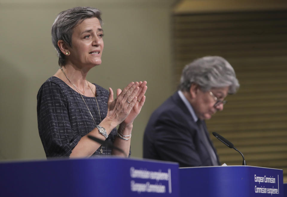 European Commissioner for Europe fit for the Digital Age Margrethe Vestager, left, and European Commissioner in charge of internal market Thierry Breton participate in a media conference on an EU approach to artificial intelligence, following a weekly meeting of EU Commissioners, at EU headquarters in Brussels, Wednesday, April 21, 2021. (Olivier Hoslet, Pool via AP)