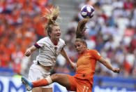 United States' Samantha Mewis vies for the ball with Netherlands' Lieke Martens, right, during the Women's World Cup final soccer match between US and The Netherlands at the Stade de Lyon in Decines, outside Lyon, France, Sunday, July 7, 2019. (AP Photo/Francisco Seco)