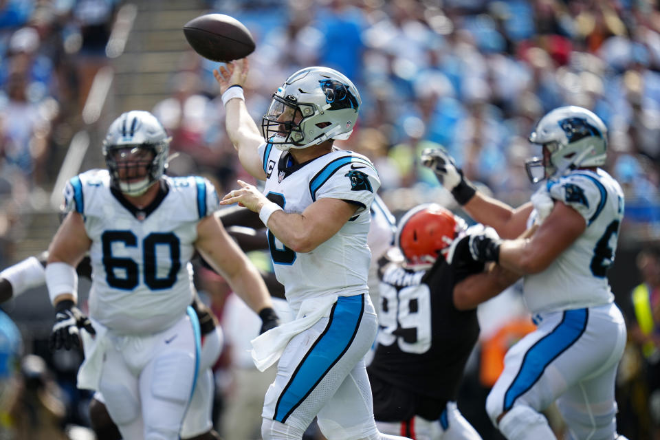 Carolina Panthers quarterback Baker Mayfield throws is first touchdown pass as a Panther during the second half of an NFL football game against the Cleveland Browns on Sunday, Sept. 11, 2022, in Charlotte, N.C. (AP Photo/Rusty Jones)