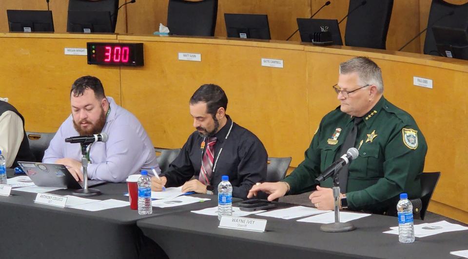 Sheriff Wayne Ivey (right) with Brevard Federation of Teachers President Anthony Colucci (center) and BFT treasurer Kyle Savage. Ivey was met with criticism Thursday over a video in which he threatened to be the "worst nightmare" for students acting out in class.