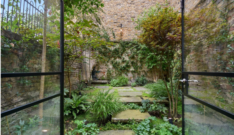 The property boasts a patio garden. Photo: Winkworth